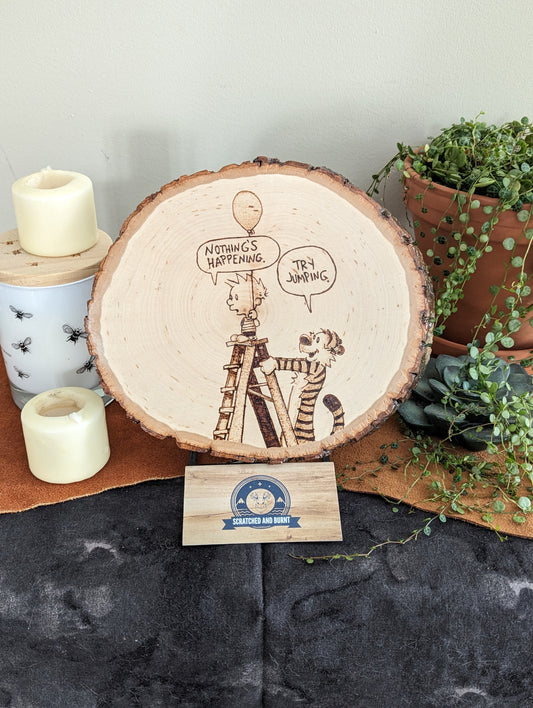 Calvin and Hobbes 'Try Jumping' Pyrography on Wood Canvas