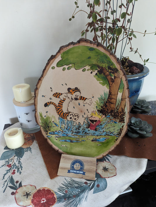 Calvin and Hobbes 'Splashing in a Puddle' Pyrography on Wood Canvas