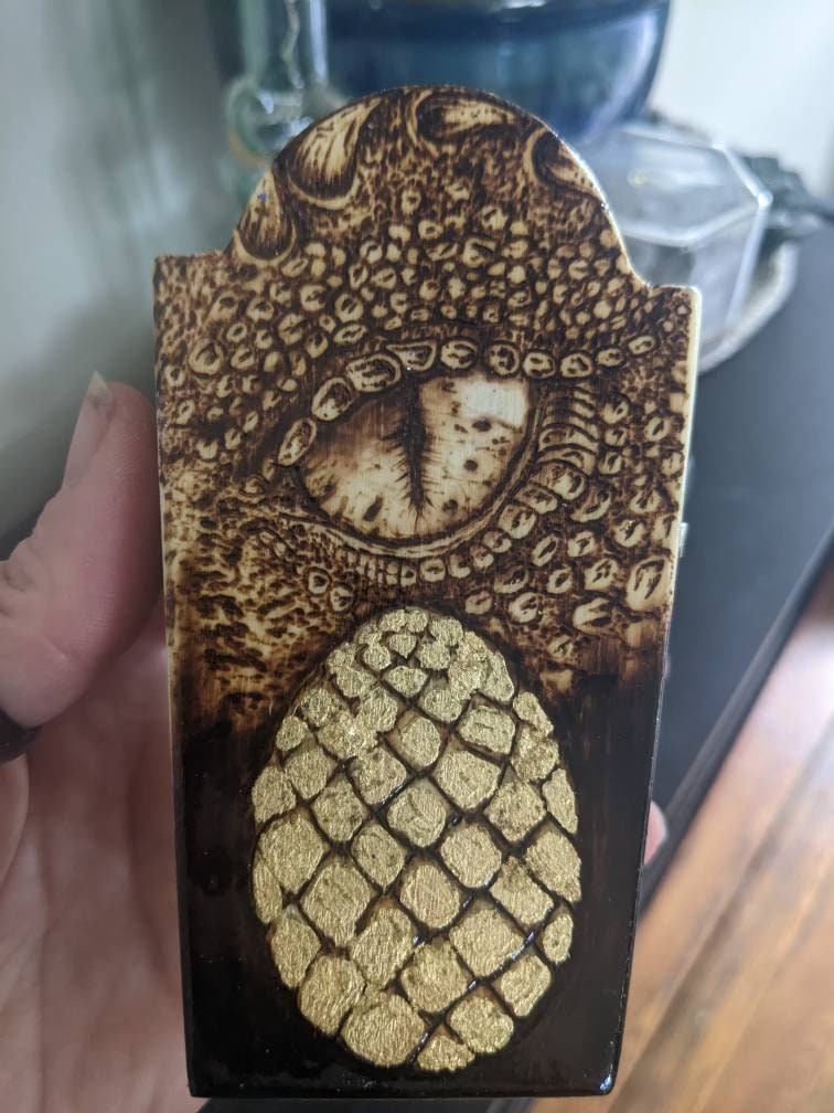 Coffin-Shaped Wooden Box Featuring Dragon Eye and Egg Art